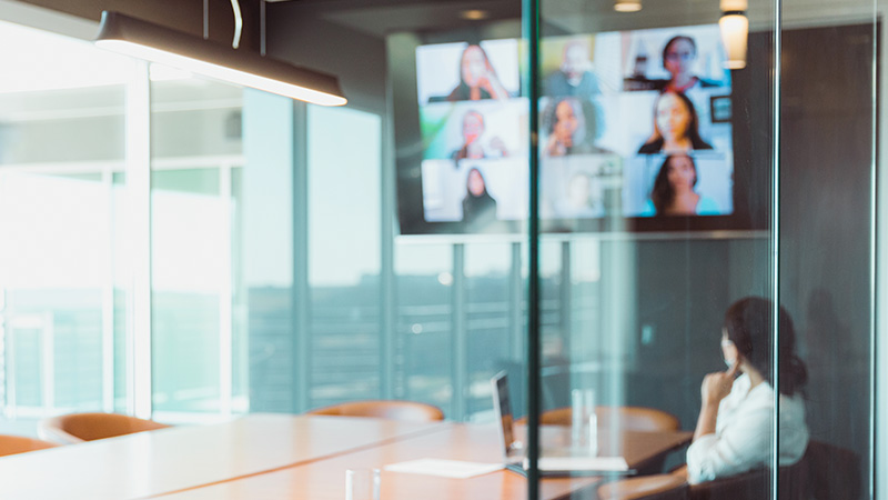 Woman in virtual conference call