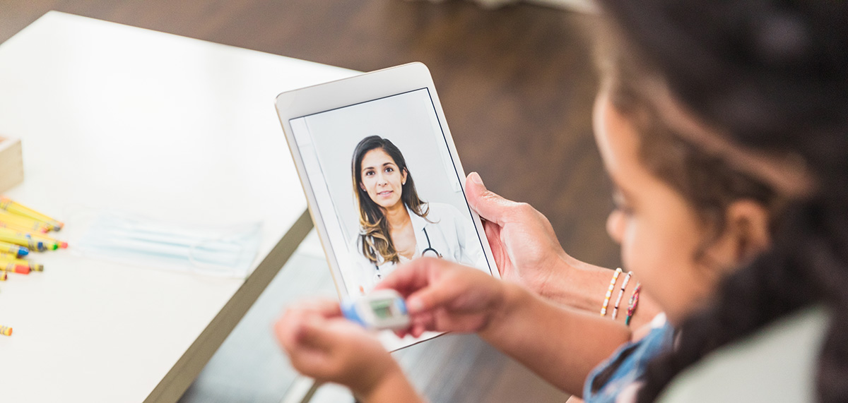 Doctor speaking with patients virtually