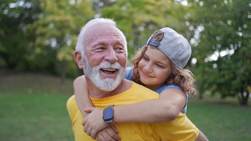 Video thumbnail of a grandfather and granddaughter playing