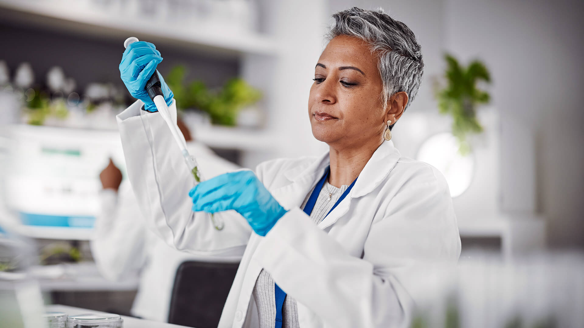 older woman working in Hospital lab environment