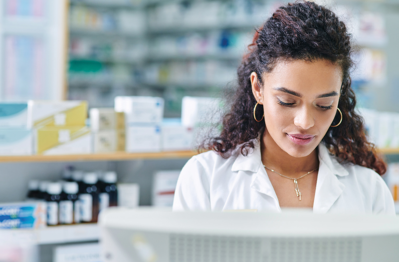 pharmacist working at desk