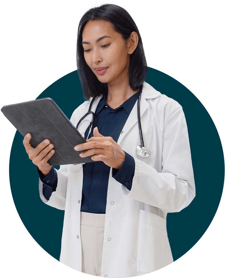 Physician reviewing patient information on a tablet