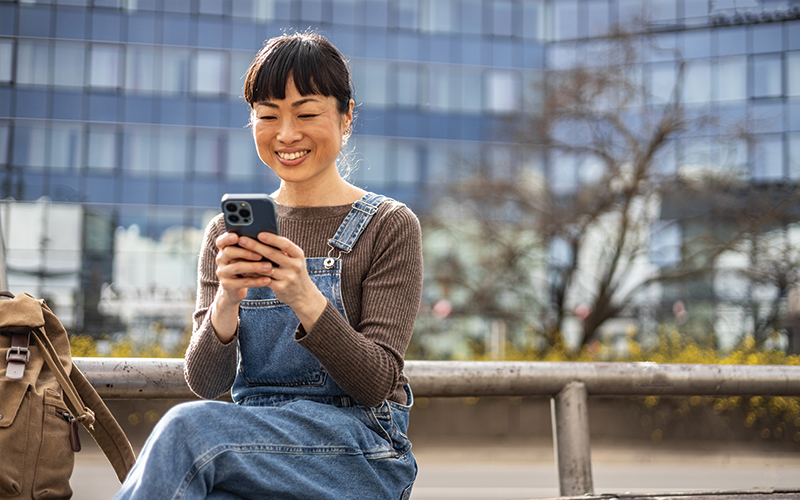 hospital receptionist talking to patient at registration counter