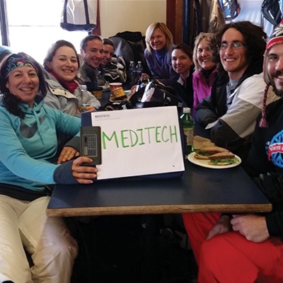 MEDITECHERs smiling at an dinner outting