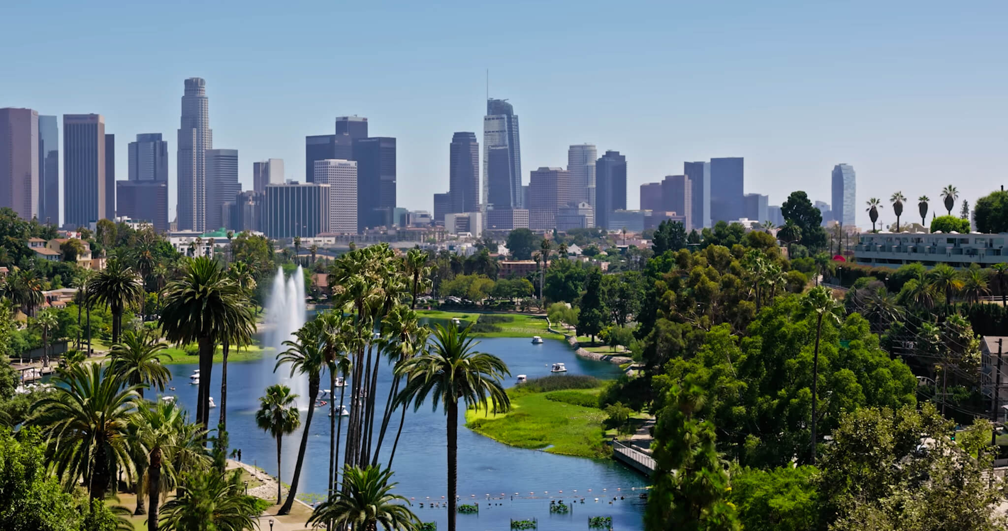 Downtown Los Angeles skyline with city buildings and palm trees