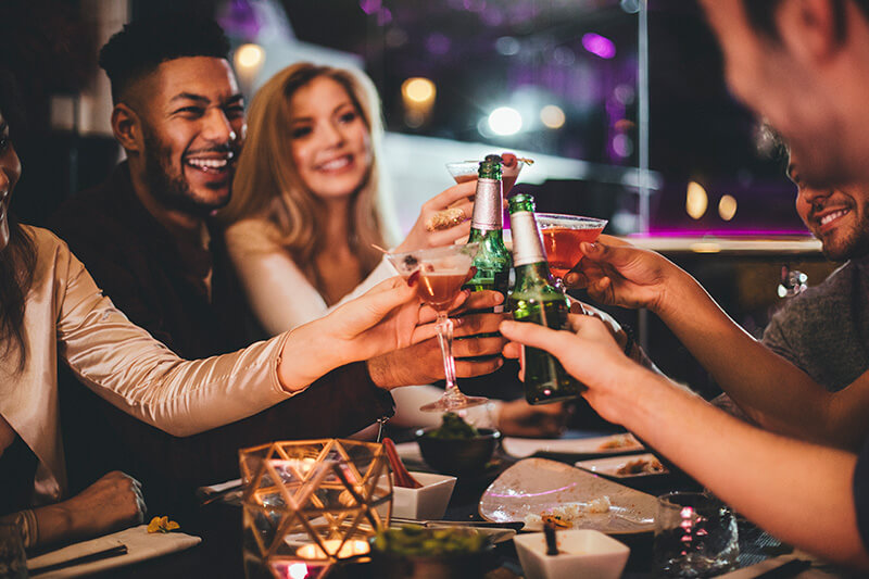 Friends cheers at a restaurant