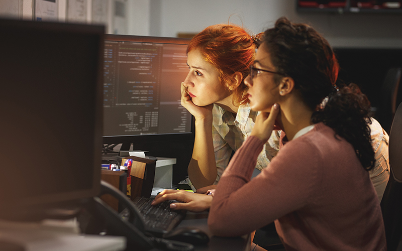 MEDITECH Greenfield Workspace - two female developers at work