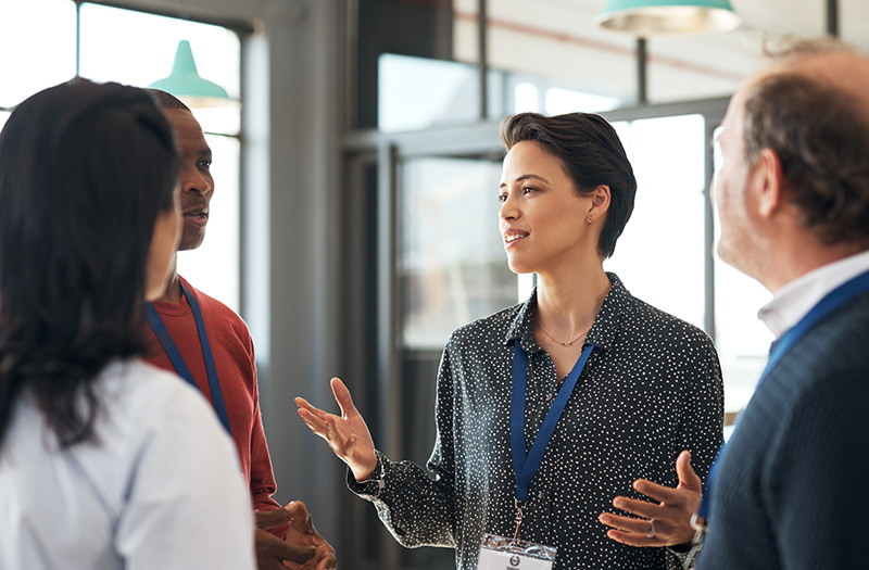 Group of businesspeople networking at a conference